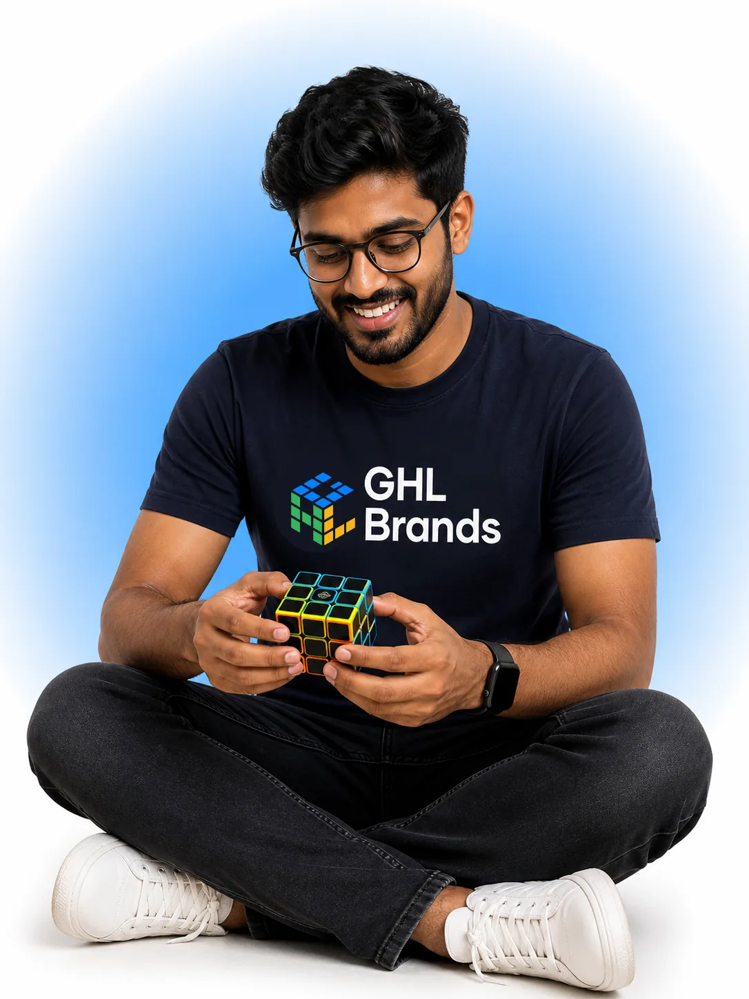 GHL Brands engineer holding a Rubik's cube, representing AI systems engineering for HighLevel